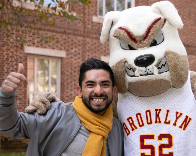 student with the mascot